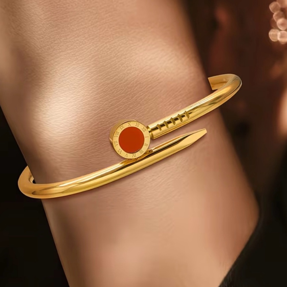 Chic Gold Bracelet with Red Detail